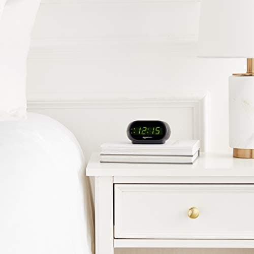Amazon Basics Small Digital Oval Alarm Clock with LED Display, Nightlight, Snooze Function & Battery Backup, Black, 4.5 x 3.5 x 2.4 Inches — view 6