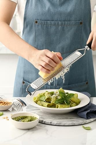 Spring Chef Stainless Steel Lemon Zester Grater with Handle - Garlic, Cheese, Parmesan, Nutmeg, Lime, Ginger Grater - Heavy Duty Kitchen Tool - Citrus Zester with Blade Cover - Fine Shred - Black — view 6