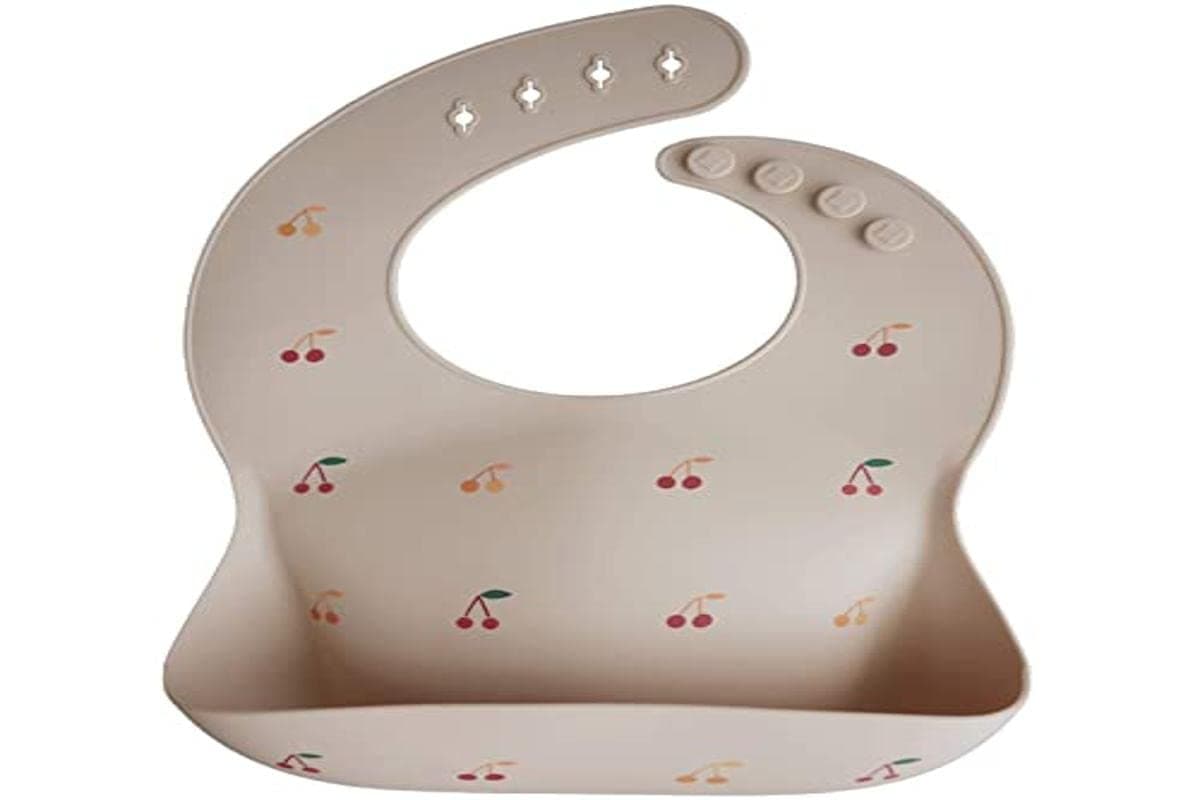 Mushie Baby Silicone Bib | Adjustable Fit Waterproof Bibs | Easy Wipe Baby Feeding Bibs | 4 Adjustable Sizes with Deep Front Pockets | 100% BPA and Phthalate Free — view 4