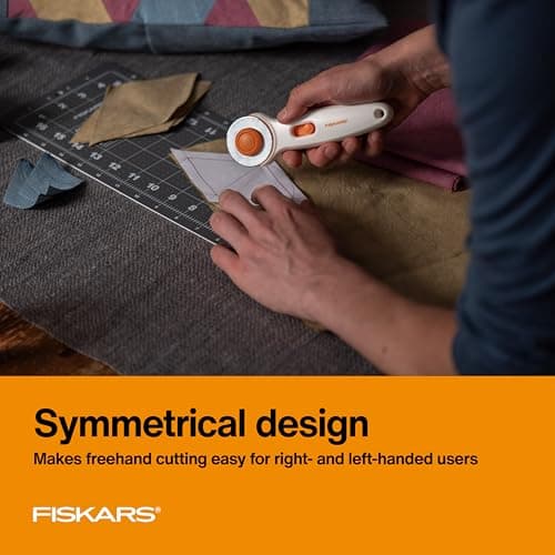 Fiskars 45mm Rotary Cutter for Fabric, Premium Steel Stick Fabric Cutter Cuts Through Multiple Layers, Right and Left Handed, Easy and Safe Blade Change, Arts and Crafts, Sewing and Quilting Tools — view 3