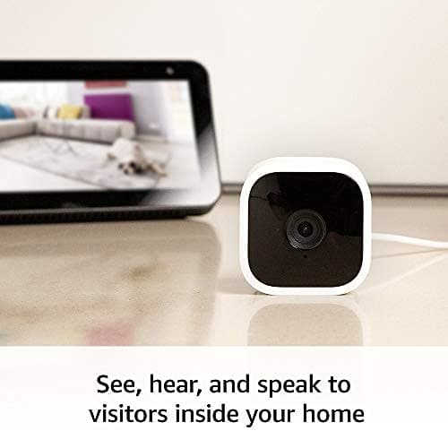 Blink Mini - Compact indoor plug-in smart security camera, 1080p HD video, night vision, motion detection, two-way audio, easy set up, Works with Alexa – 1 camera (White) — view 2