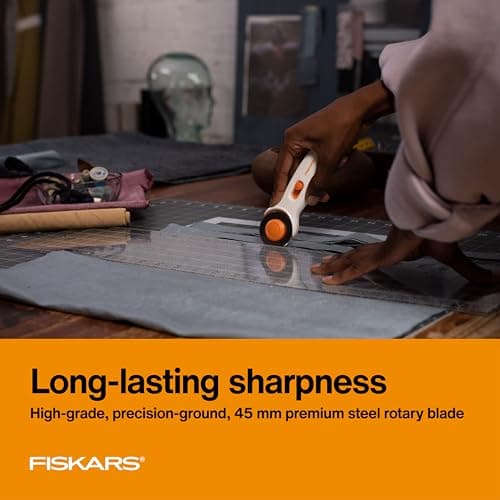Fiskars 45mm Rotary Cutter for Fabric, Premium Steel Stick Fabric Cutter Cuts Through Multiple Layers, Right and Left Handed, Easy and Safe Blade Change, Arts and Crafts, Sewing and Quilting Tools — view 4
