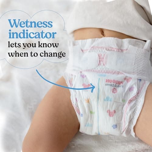 Huggies Size 1 Diapers, Snug & Dry Newborn Diapers, Size 1 (8-14 lbs), 44 Count, Packaging May Vary — view 7