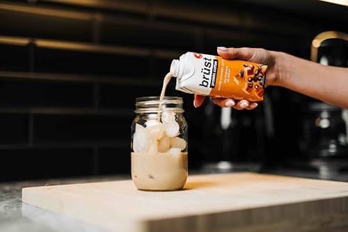 BRÜST PROTEIN COFFEE SALTED CARAMEL LATTE - Caramelly indulgence slightly sweet (20g Protein, 75mg Caffeine, 100 Calories) Caramel, Smooth, Slightly Sweetened Cold Brew Coffee, 330mL, 12 Pack, Brust Iced Coffee - AS SEEN ON DRAGON'S DEN — view 3