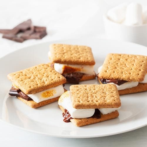 Nostalgia Tabletop Indoor Electric S'mores Maker - Smores Kit With Marshmallow Roasting Sticks and 4 Tray Lazy Susan for Graham Crackers, Chocolate, and Marshmallows - Movie Night Supplies - Brown — view 3