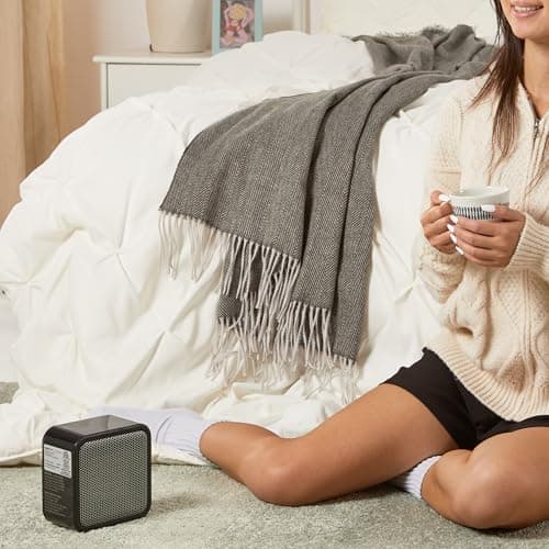 Amazon Basics Ceramic Portable Mini Space Heater for Office Desk, Indoor Use, Fast Heating, Energy Efficient, 500W, With Tip-Over Protection, Lightweight 1.4 lbs, Black, 5.87"D x 3.15"W x 5.95"H — view 4