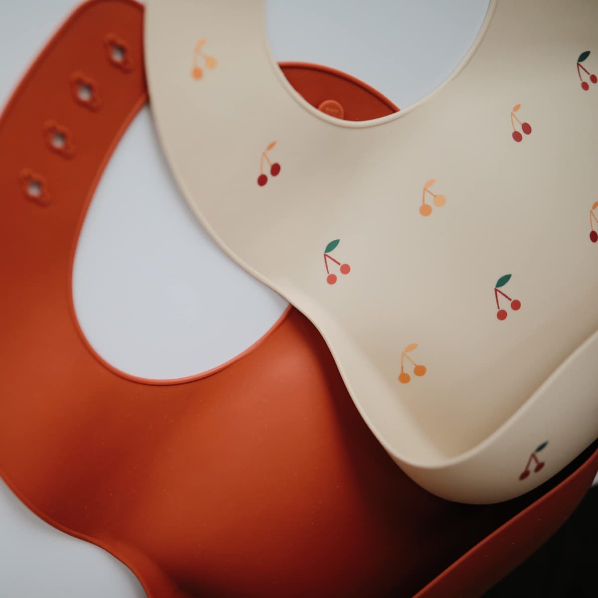 Mushie Baby Silicone Bib | Adjustable Fit Waterproof Bibs | Easy Wipe Baby Feeding Bibs | 4 Adjustable Sizes with Deep Front Pockets | 100% BPA and Phthalate Free — view 2