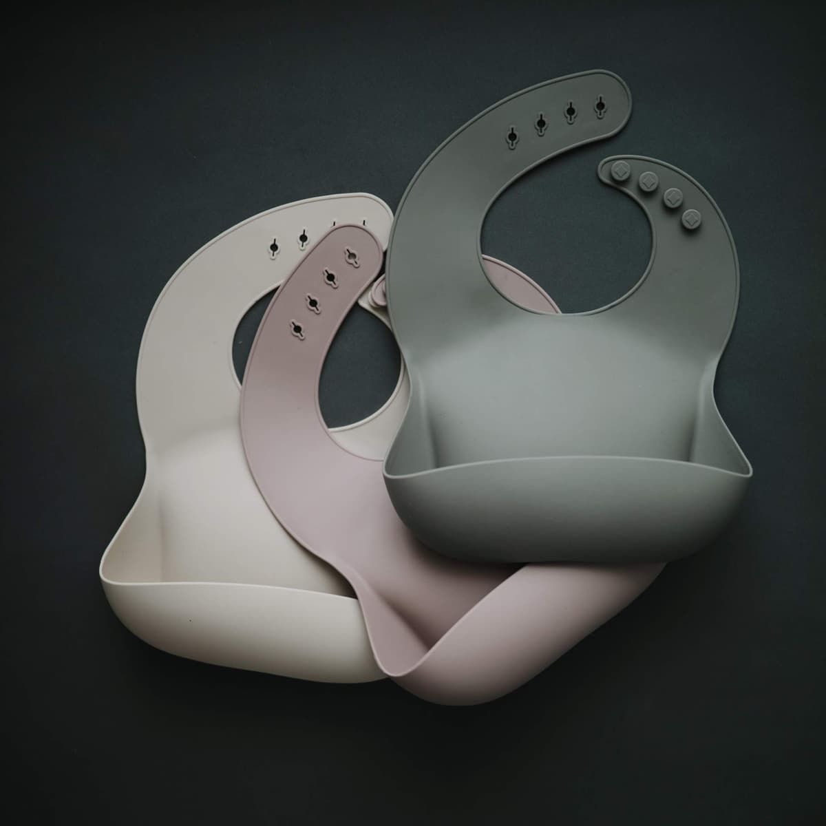 Mushie Baby Silicone Bib | Adjustable Fit Waterproof Bibs | Easy Wipe Baby Feeding Bibs | 4 Adjustable Sizes with Deep Front Pockets | 100% BPA and Phthalate Free — view 4