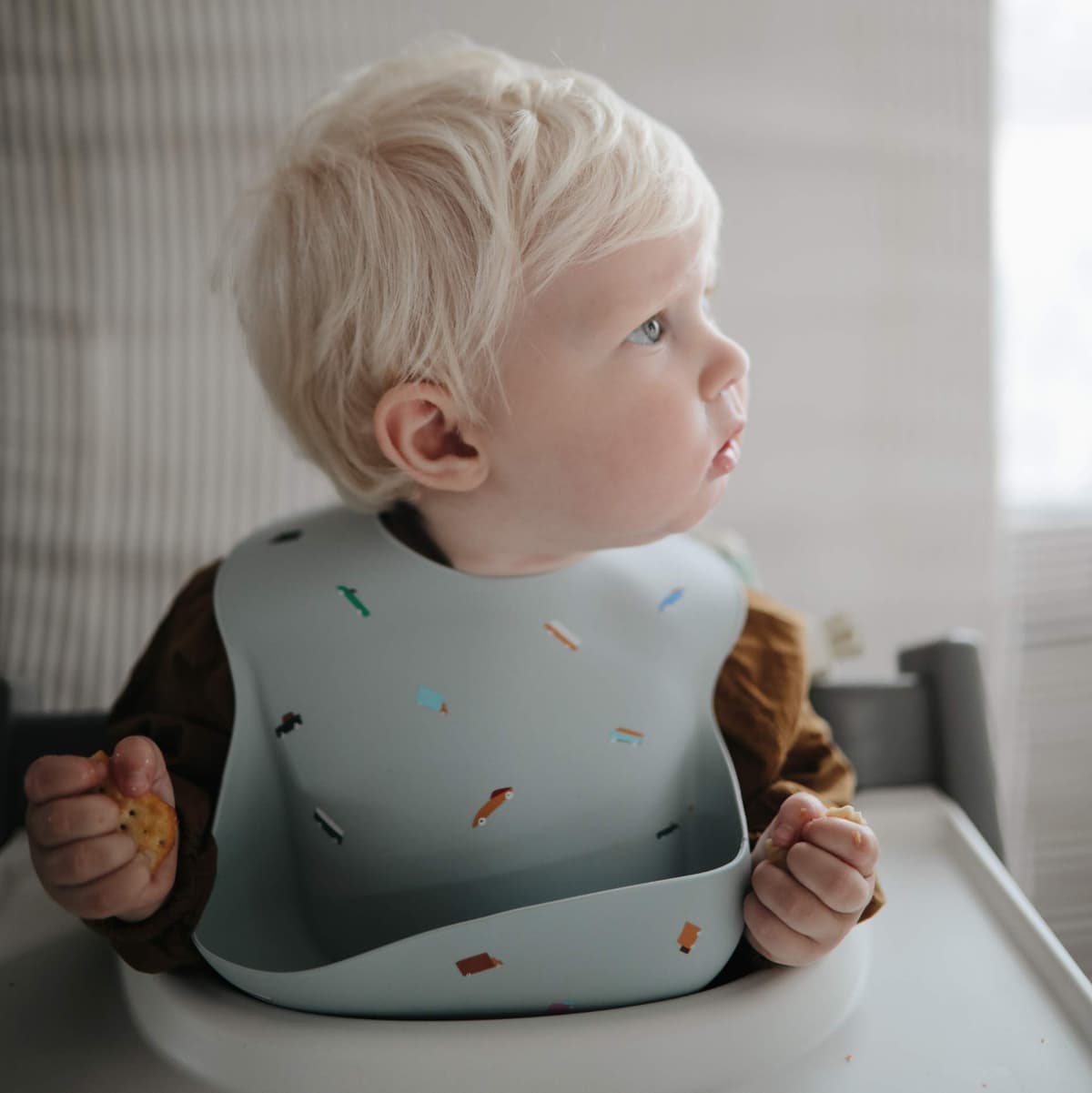 Mushie Baby Silicone Bib | Adjustable Fit Waterproof Bibs | Easy Wipe Baby Feeding Bibs | 4 Adjustable Sizes with Deep Front Pockets | 100% BPA and Phthalate Free — view 5