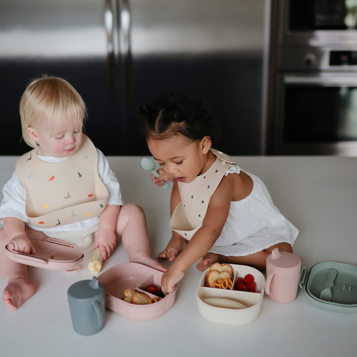 Mushie Baby Silicone Bib | Adjustable Fit Waterproof Bibs | Easy Wipe Baby Feeding Bibs | 4 Adjustable Sizes with Deep Front Pockets | 100% BPA and Phthalate Free — view 6