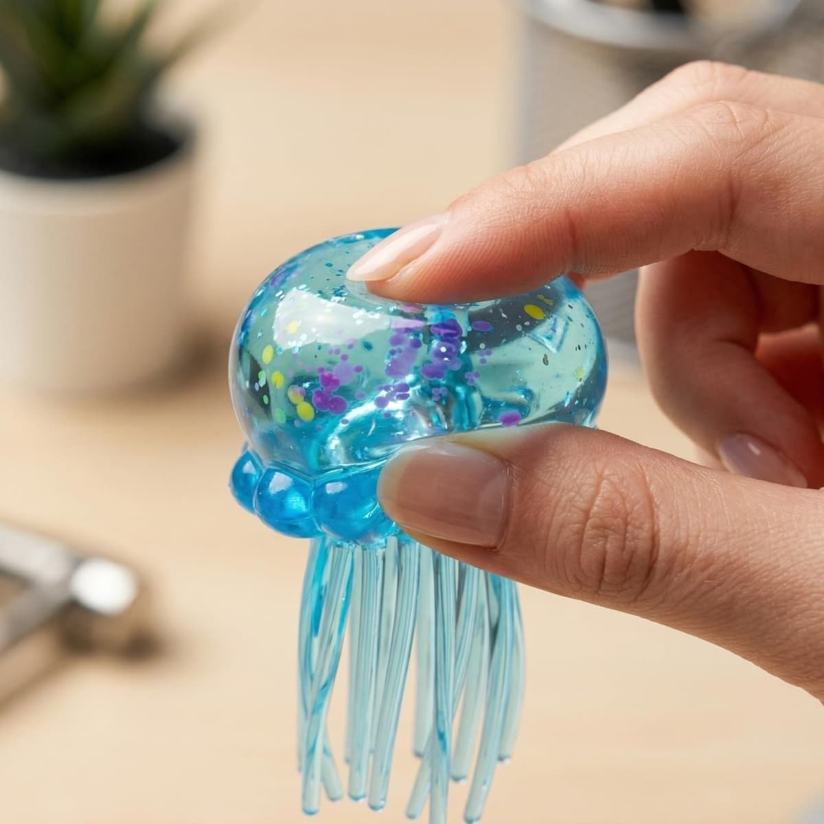 Nee doh Glitter Jellyfish Squishy Toy, Stress Relief Fidget Toy for Adults, Soft TPR Sensory Toy with Wiggly Tentacles, Portable Anxiety Relief Squeeze Ball for Office, School & Travel (Blue) — view 3