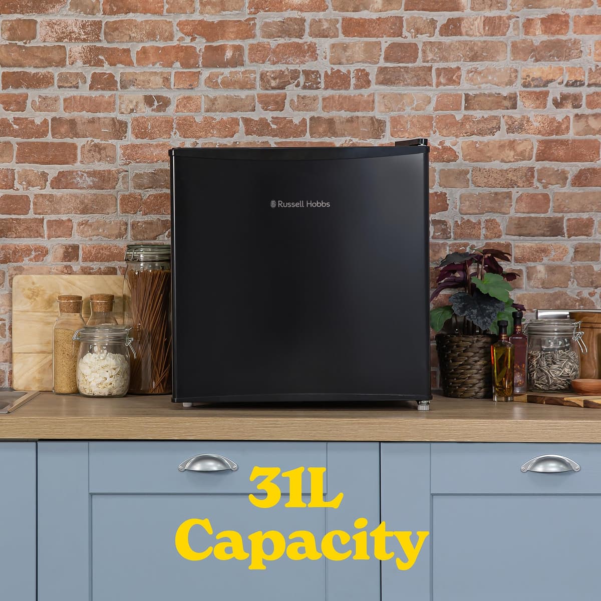 Russell Hobbs Mini Freezer 31 Litre Capacity Black Freestanding Table Top Small Freezer with Adjustable Feet, Removable Shelf & Reversible Door RHTTFZ0E1B — view 3