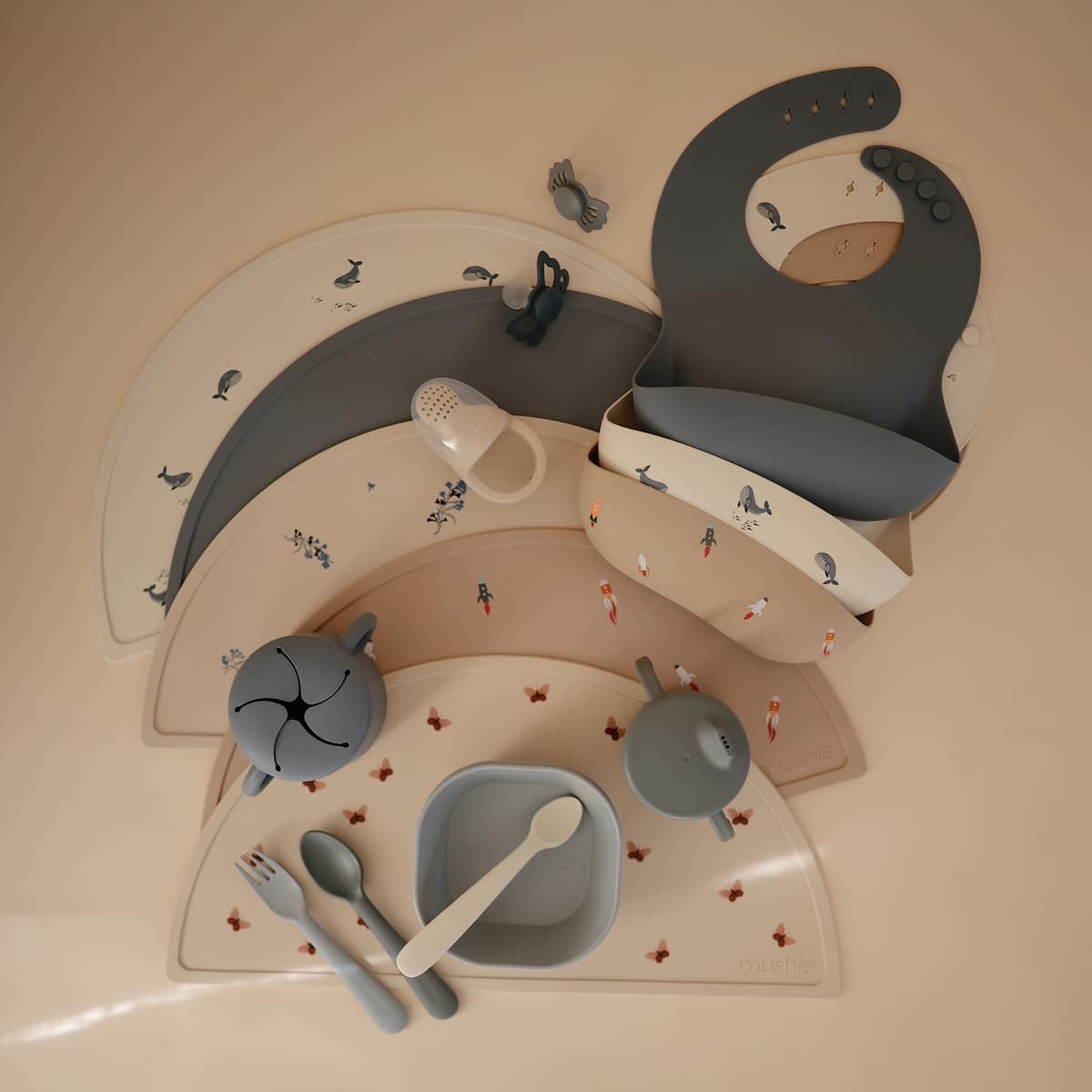 Mushie Baby Silicone Bib | Adjustable Fit Waterproof Bibs | Easy Wipe Baby Feeding Bibs | 4 Adjustable Sizes with Deep Front Pockets | 100% BPA and Phthalate Free — view 5