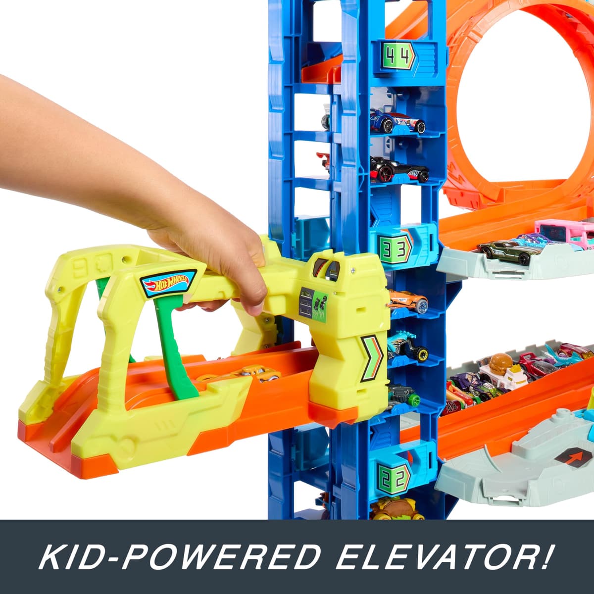 Hot Wheels City “Let's Race - ¡a Correr!” Netflix - Garaje definitivo Pista para Coches de Juguete con dragón y 4 Niveles, Incluye 2 vehículos, +4 años (Mattel HKX48) — view 4
