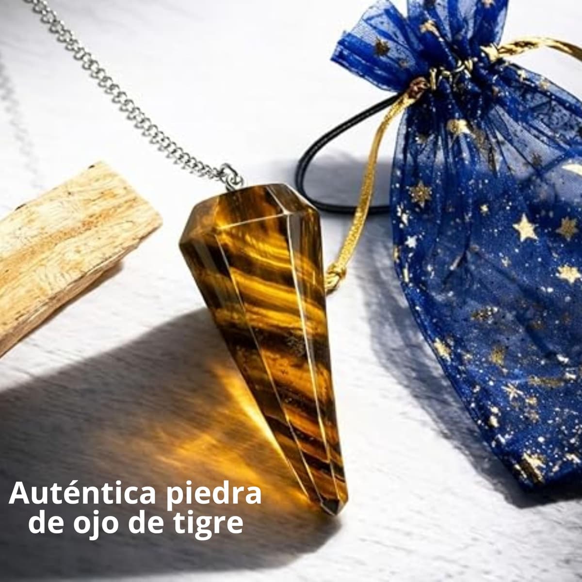 ME HECHIZAS TU Péndulo Adivinación Ojo deTigre Natural + 1 Palo Santo + Bolsa de Almacenamiento | Herramienta de Radiestesia y Meditación para Tarot, Reiki y Sanación Espiritual | Cristal Auténtico. — view 2
