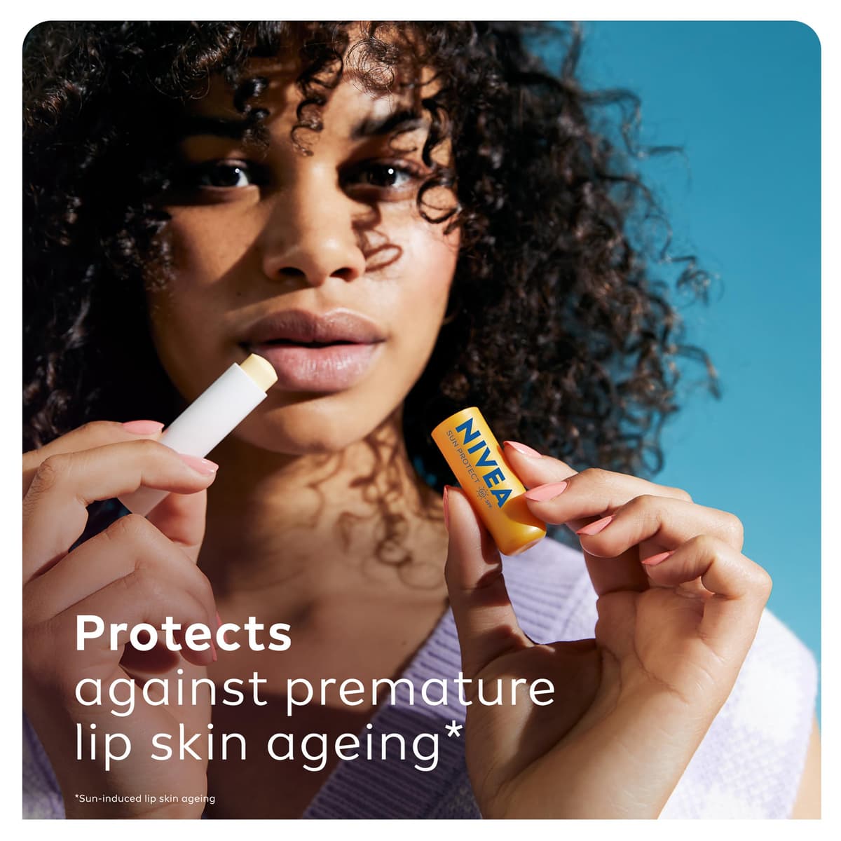 NIVEA SUN Protect Caring Lip Balm SPF50 (4.8g), Factor 50 Balm with Shea Butter, Protection Against UVA/UVB Rays with 24H Moisture, Lip Care, No White Cast — view 3