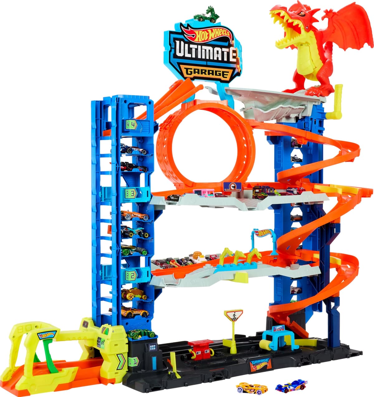 Hot Wheels City “Let's Race - ¡a Correr!” Netflix - Garaje definitivo Pista para Coches de Juguete con dragón y 4 Niveles, Incluye 2 vehículos, +4 años (Mattel HKX48)